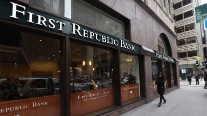 Person walking in front of First Republic Bank headquarters in San Francisco